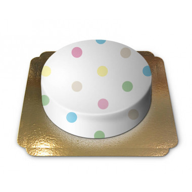 Weiße Torte mit pastell-farbigen Punkten