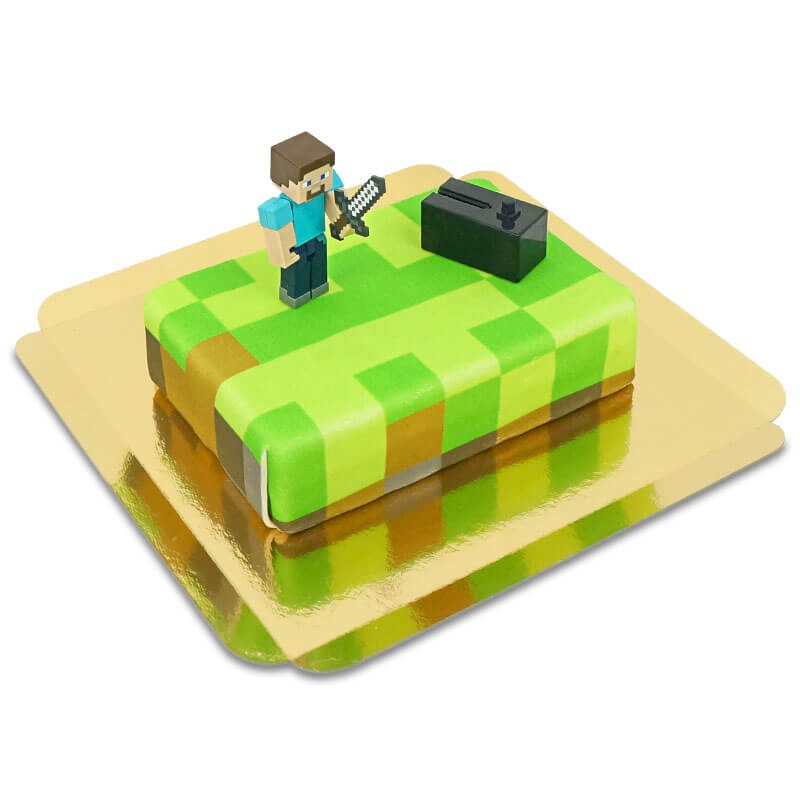 Minecraft-Figur auf Spielewelt-Torte